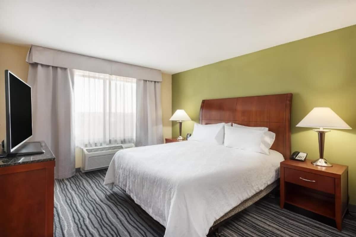 Down duvets, pillow-top beds, in-room safe, desk