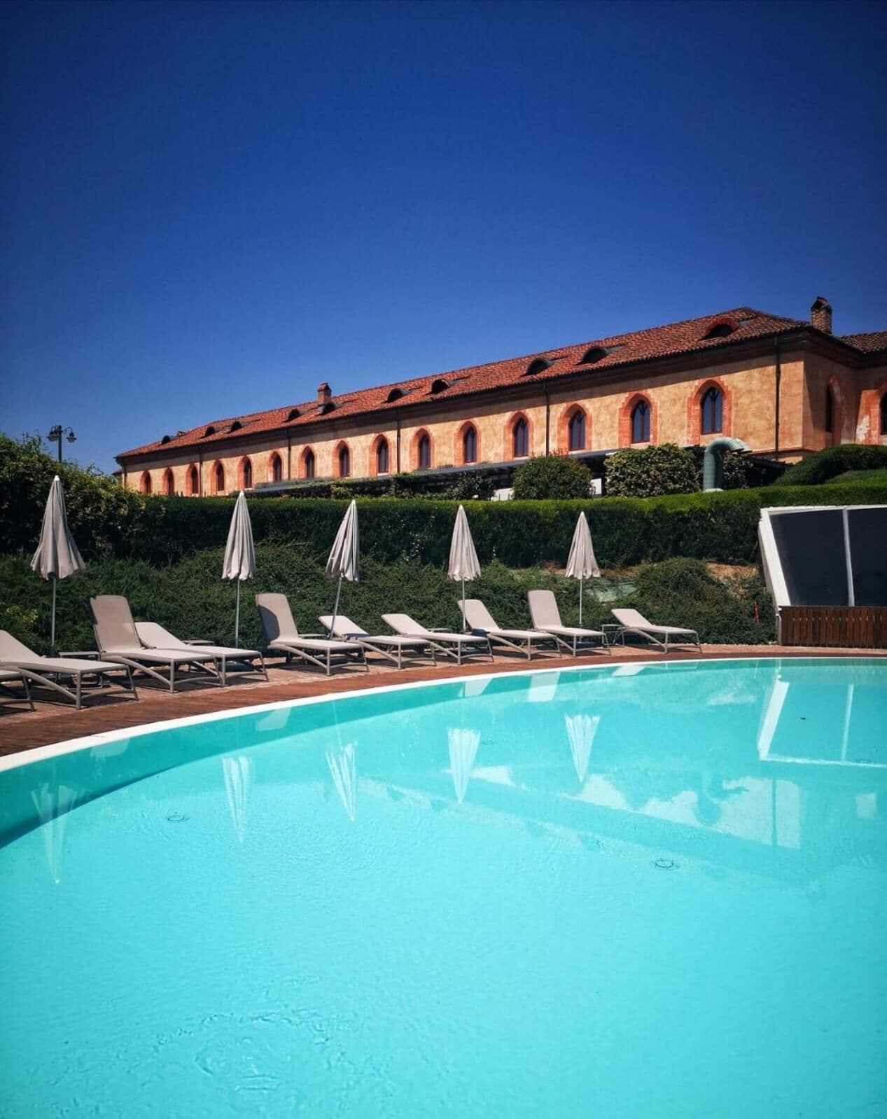 seasonal outdoor pool, open 10:00 am to 5:00 pm, pool umbrellas