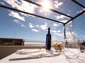 Enjoy a meal al fresco with a clear view of the sky.