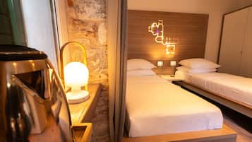 Standard Twin Room | Down comforters, individually decorated, individually furnished, desk