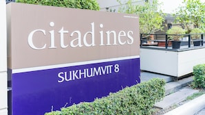 A sign for Citadines Sukhumvit 8, indicating the hotel's name and location.