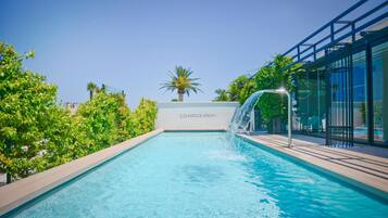 Seasonal outdoor pool, pool umbrellas, sun loungers