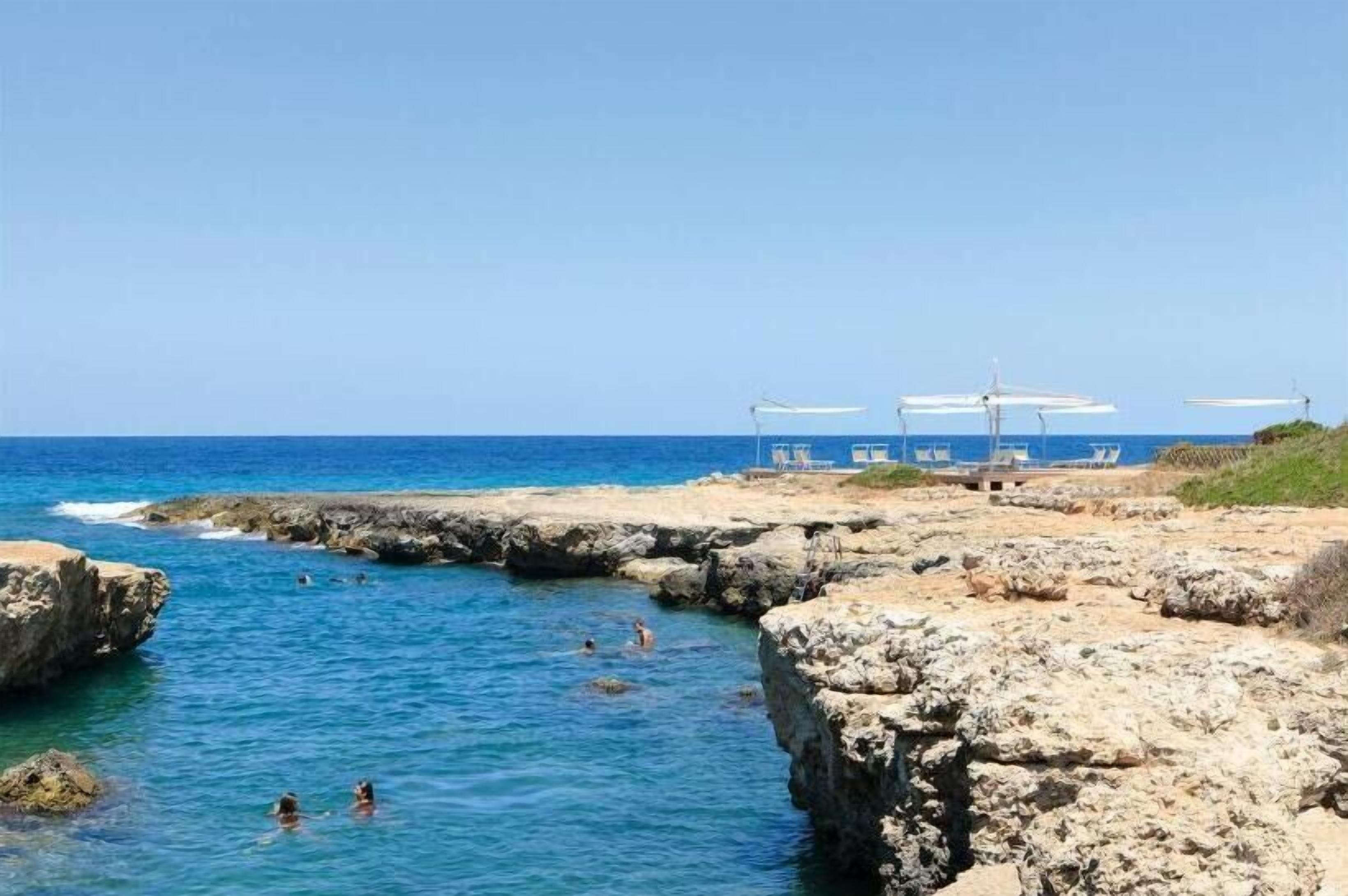 private beach nearby, sun-loungers, beach umbrellas