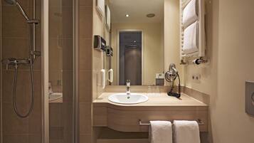 Shower, free toiletries, hair dryer, towels
