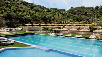 2 outdoor pools, pool umbrellas, pool loungers