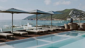 2 outdoor pools, pool umbrellas, sun loungers