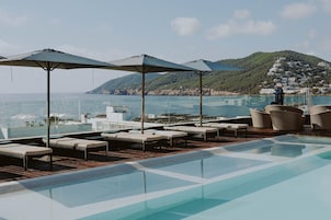 2 outdoor pools, pool umbrellas, sun loungers