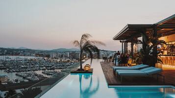 2 outdoor pools, pool umbrellas, pool loungers