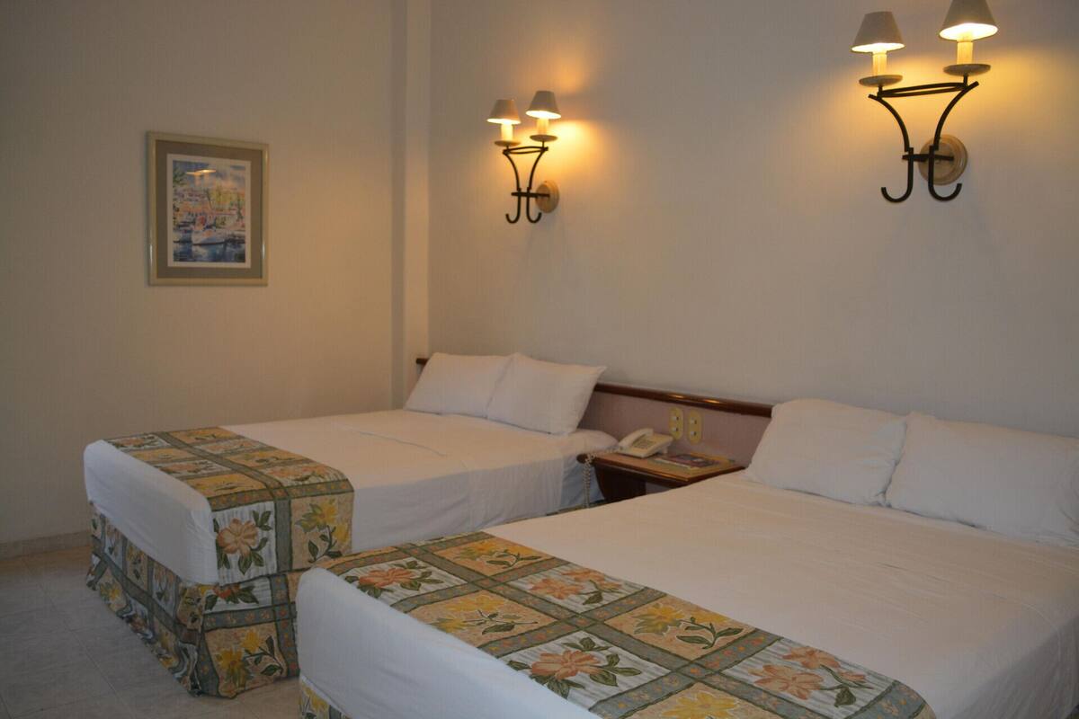 Iron/ironing board (on request), free WiFi, alarm clocks