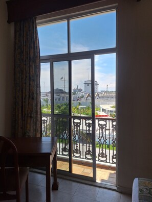 Double Room, 2 Double Beds, Partial Sea View | Iron/ironing board, free WiFi, alarm clocks