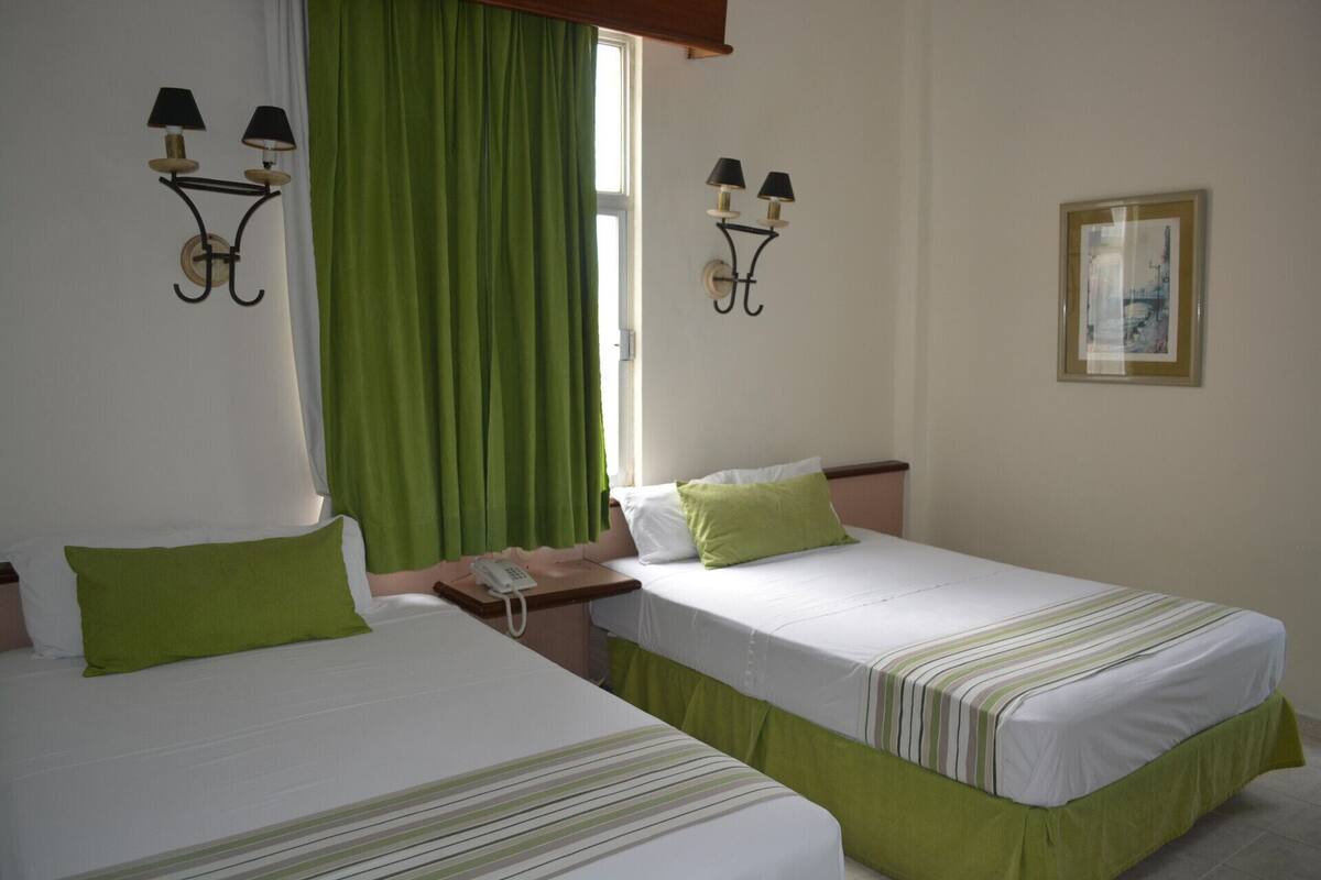 Iron/ironing board (on request), free WiFi, alarm clocks