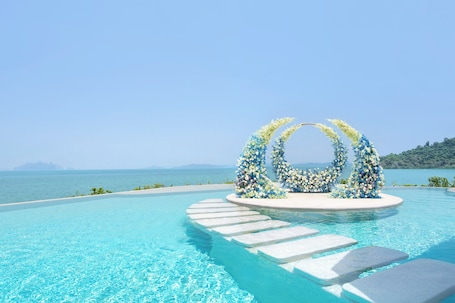 Outdoor pool, open 7:00 AM to 7:00 PM, pool umbrellas, sun loungers