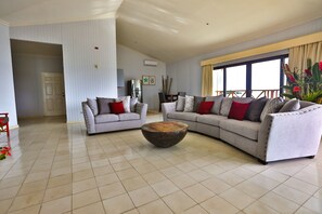 Presidential Suite, 1 Bedroom, Beach View | Living area | 32-inch flat-screen TV with satellite channels, TV - Playa Tortuga Hotel Beach And Resort (Bocas del Toro)