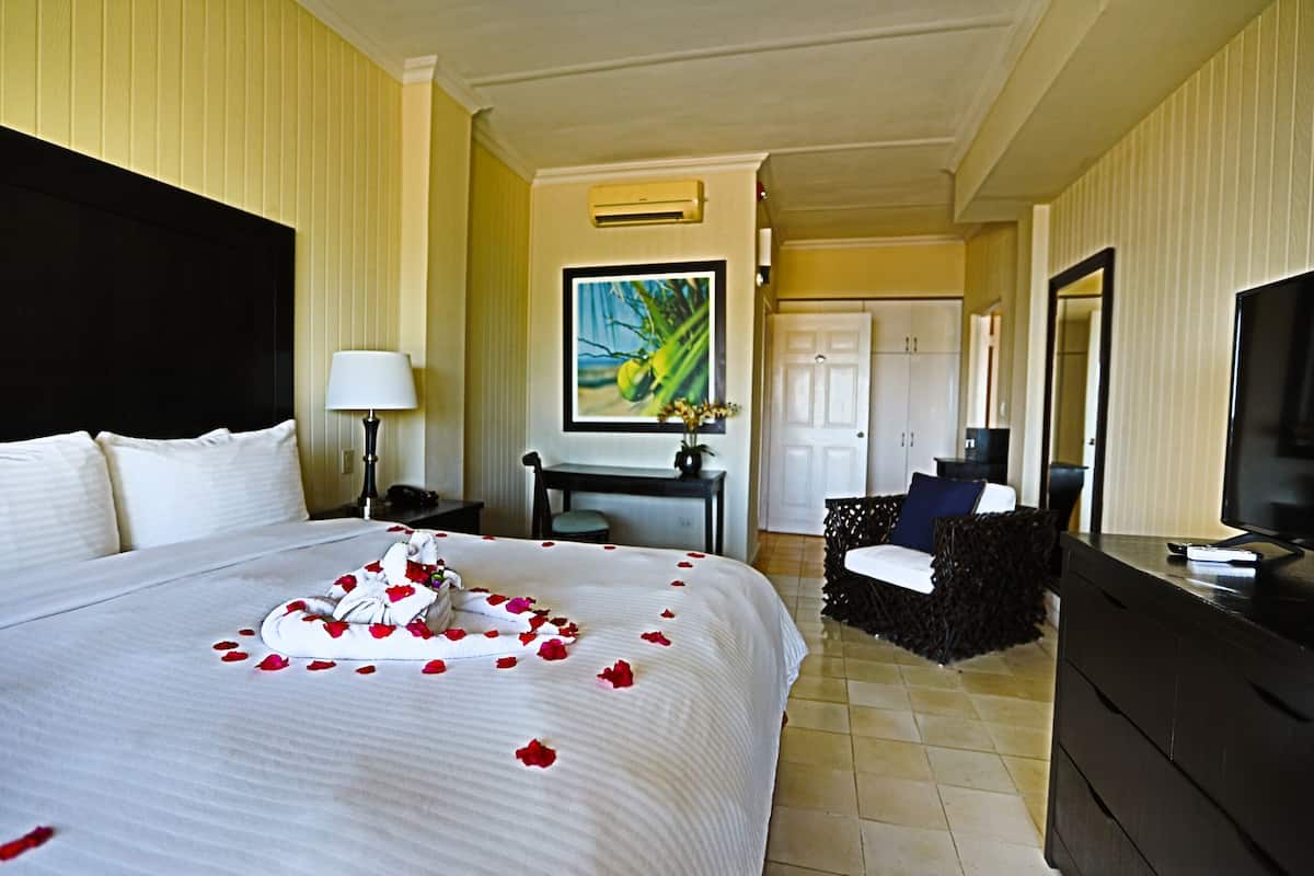 Superior Suite, 1 Bedroom, Beach View | In-room safe, blackout drapes, iron/ironing board, free WiFi