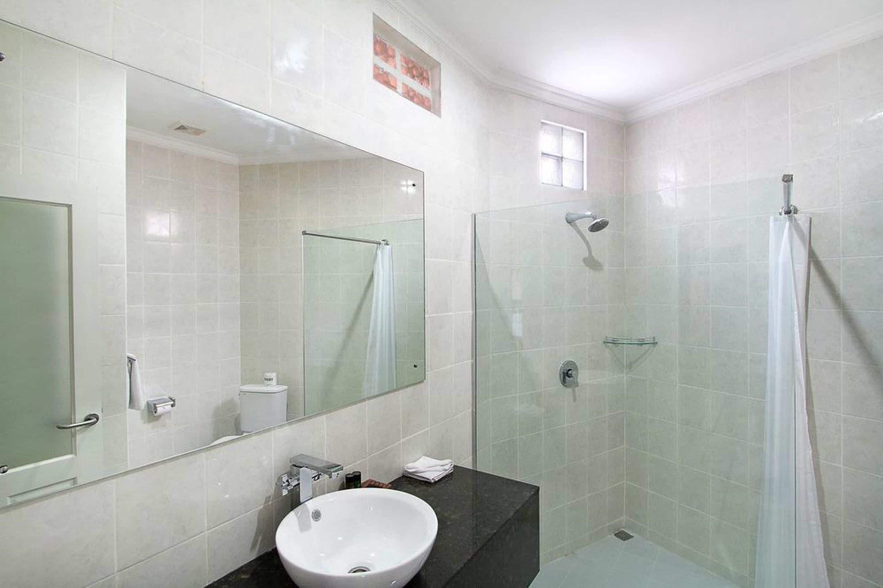 superior room | bathroom | shower, free toiletries, hair dryer, slippers