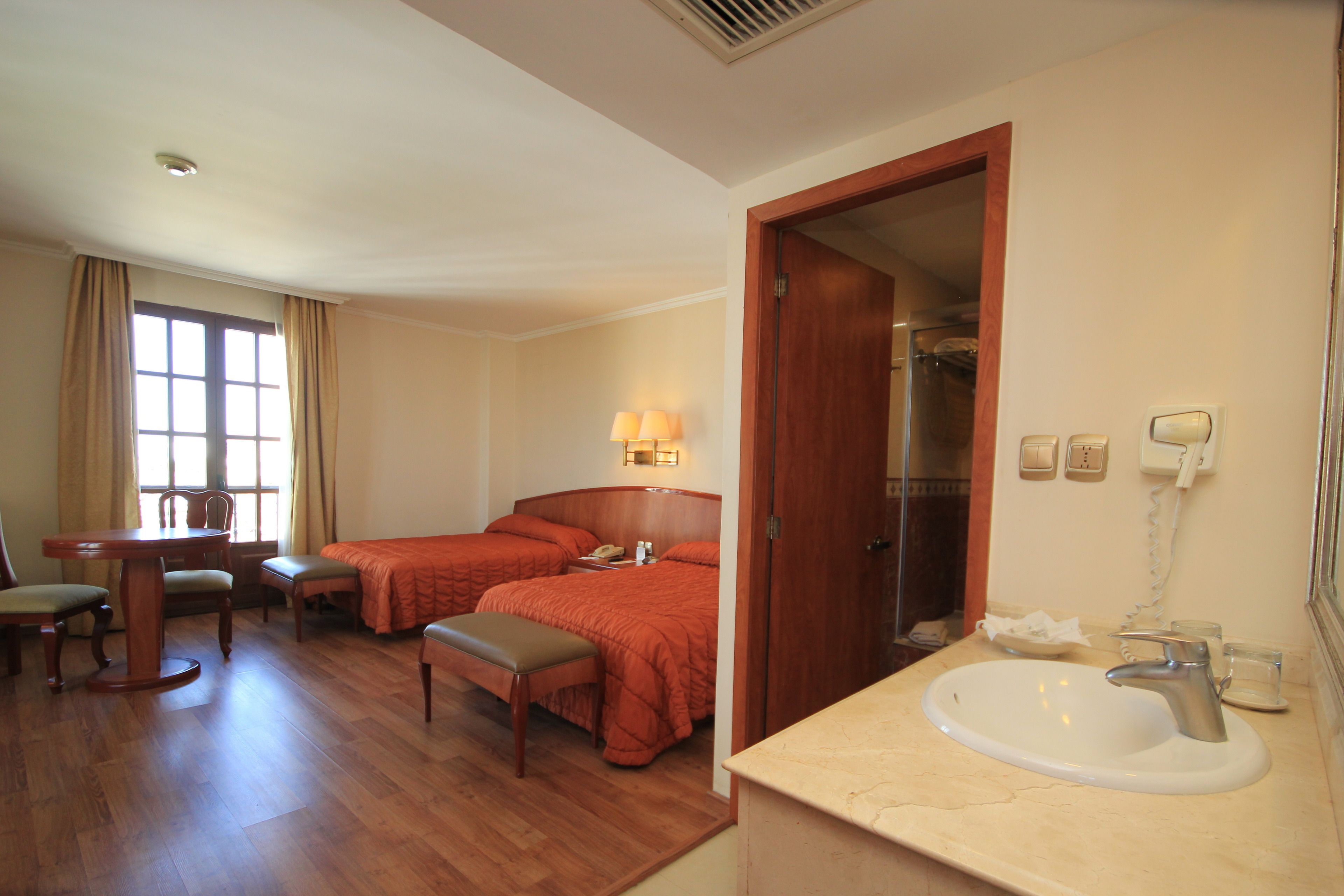 standard double room | premium bedding, down duvets, in-room safe, desk