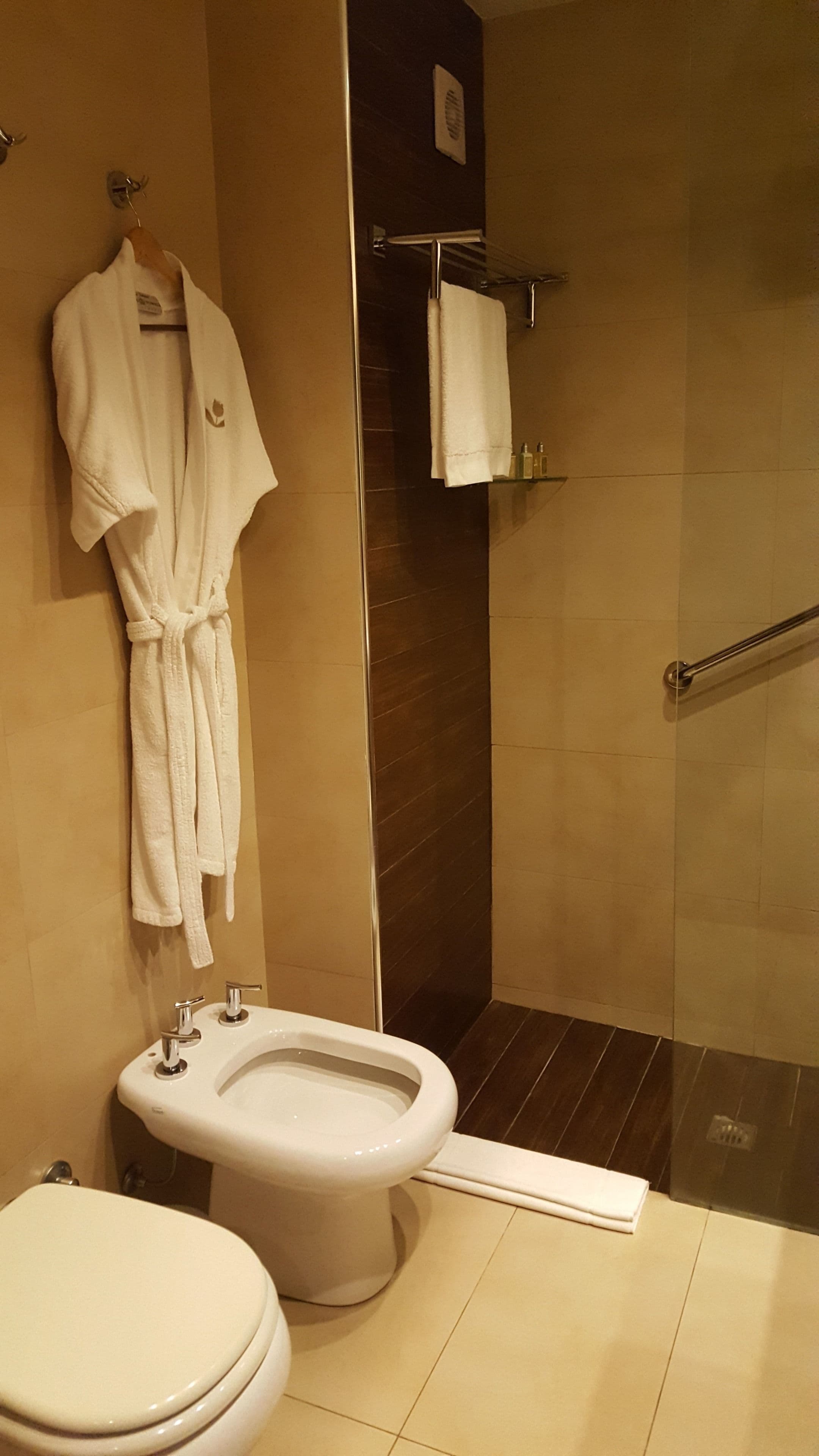 shower, rainfall showerhead, designer toiletries, hair dryer