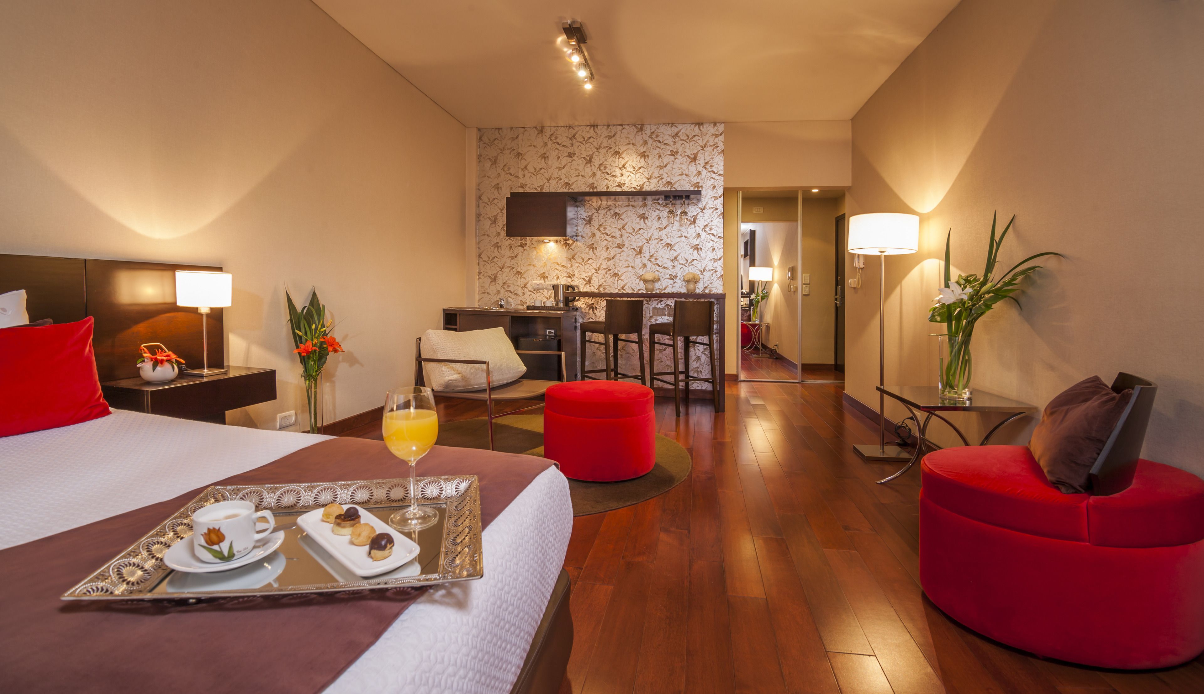 deluxe studio suite | premium bedding, down duvets, minibar, in-room safe