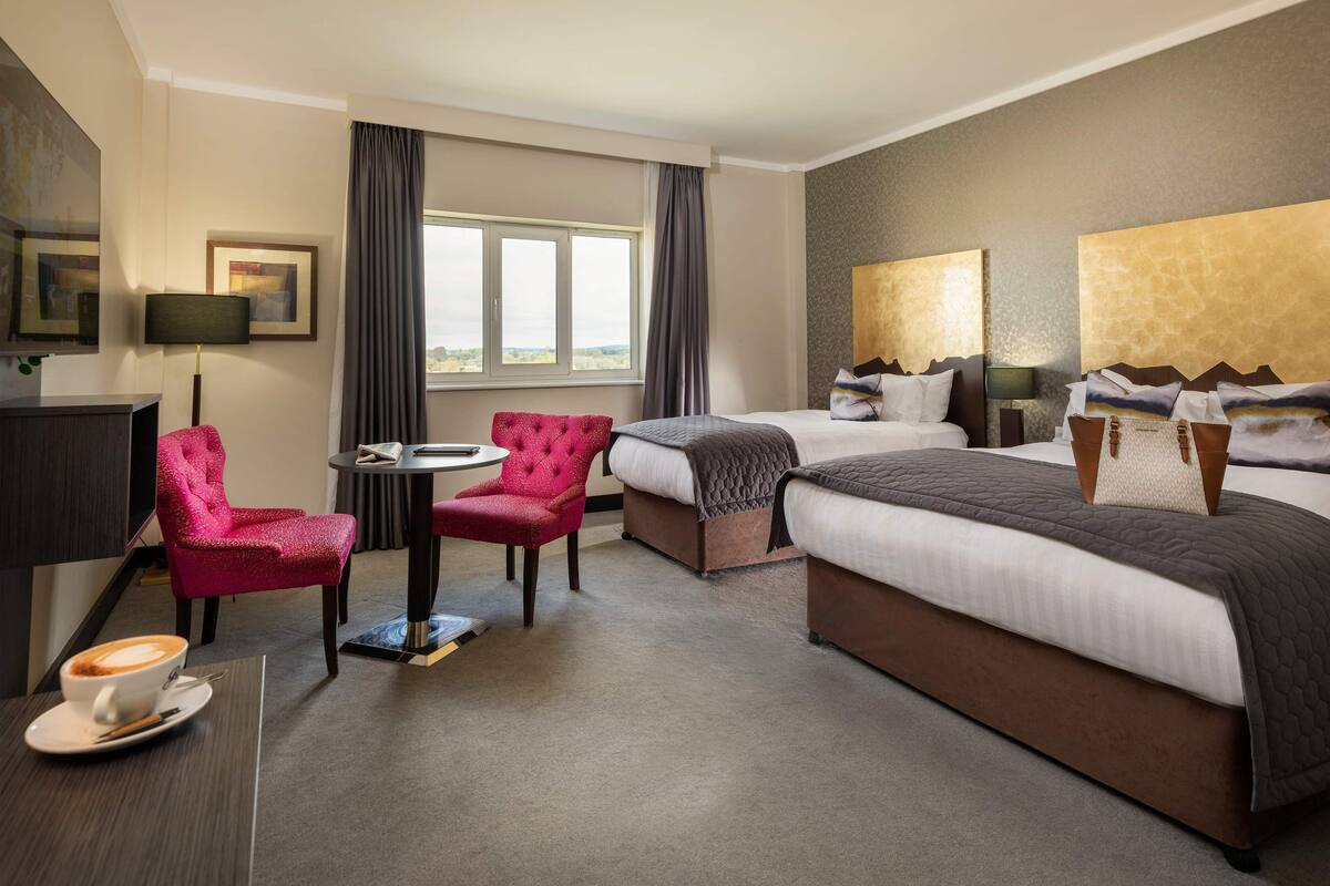 premium bedding, desk, blackout curtains, iron/ironing board