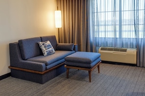 Desk, laptop workspace, blackout drapes, iron/ironing board