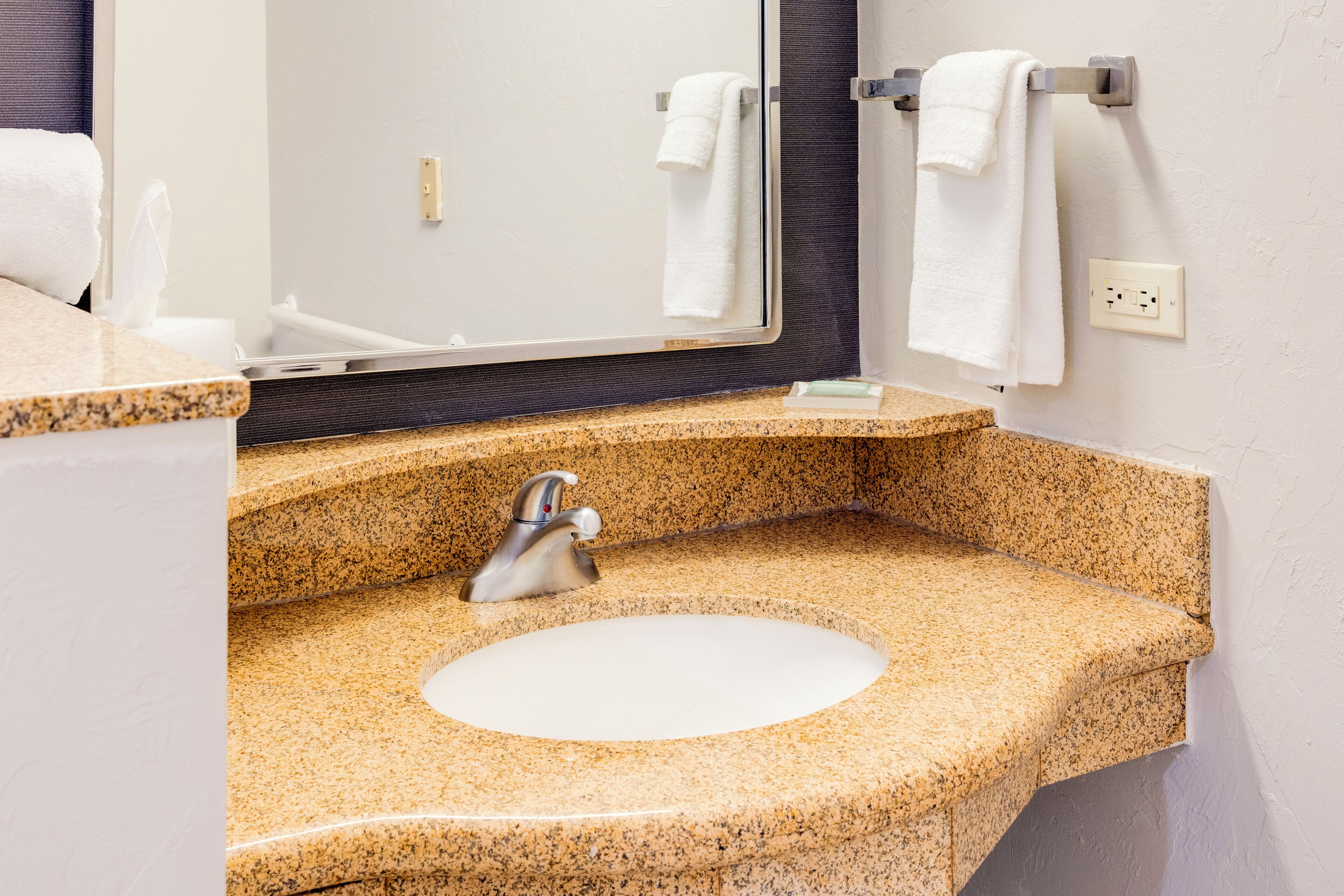 combined shower/bathtub, hair dryer, towels, soap