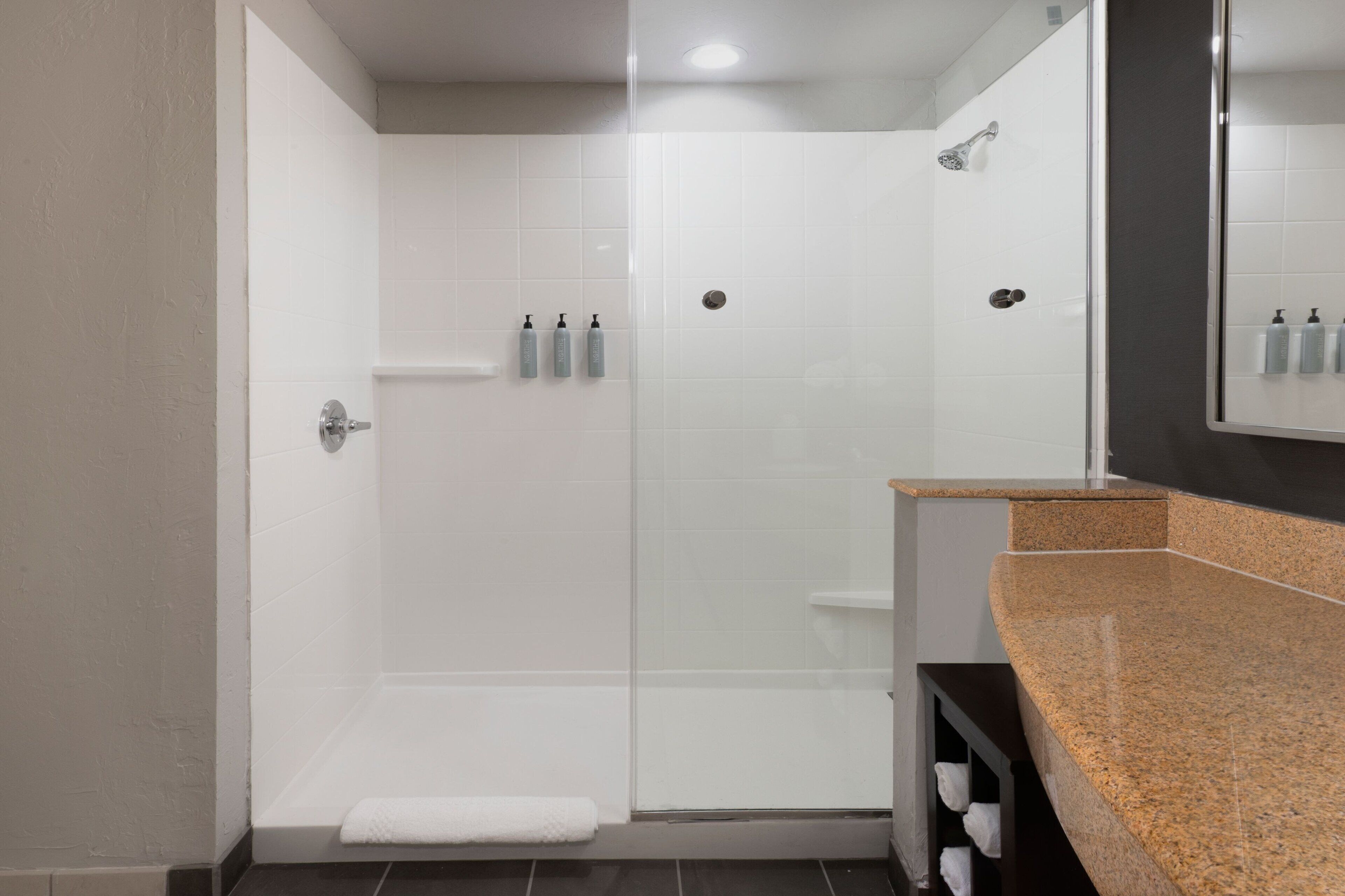 Combined shower/bathtub, hair dryer, towels, soap