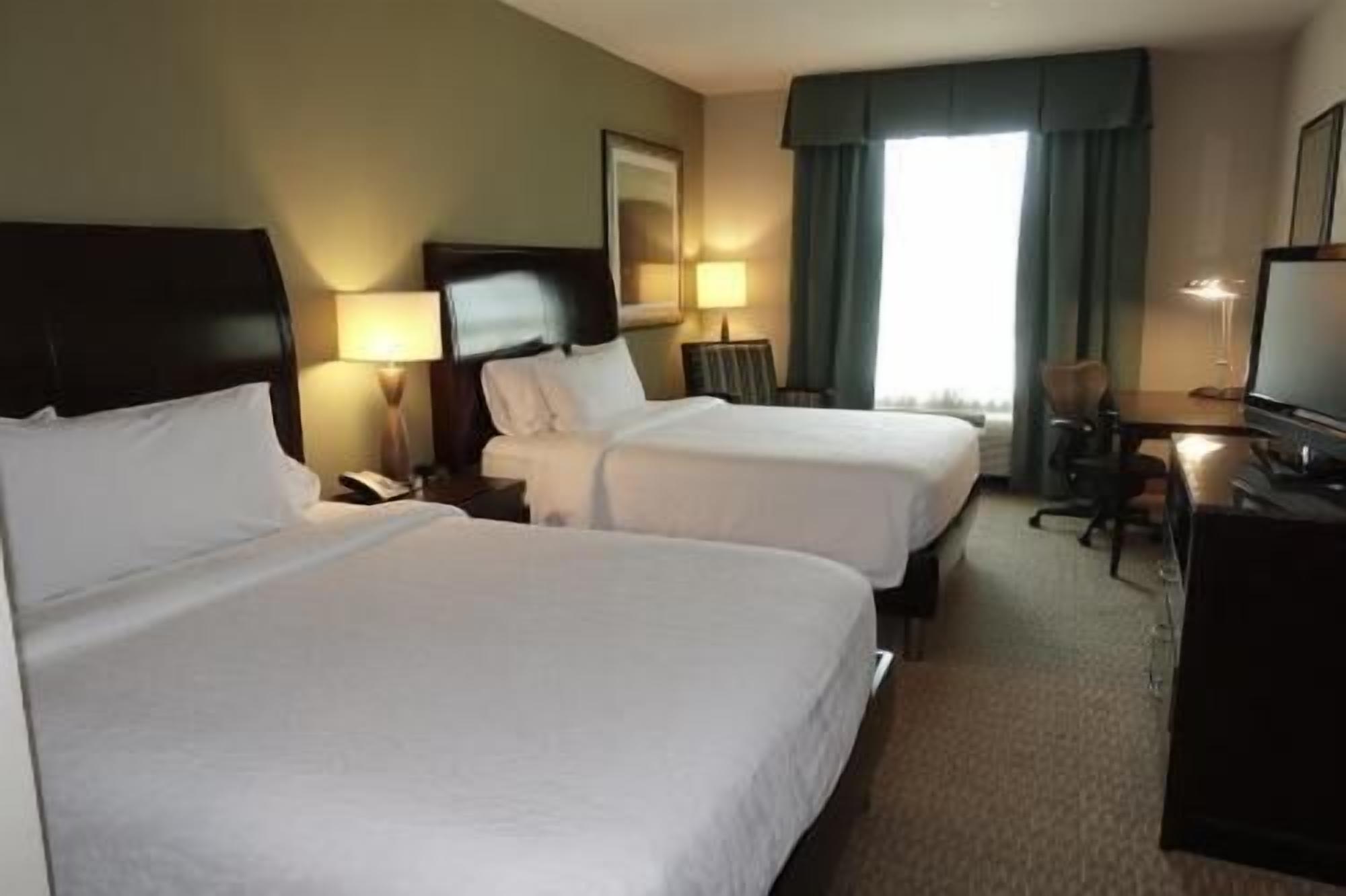 Premium bedding, down comforters, Tempur-Pedic beds, in-room safe