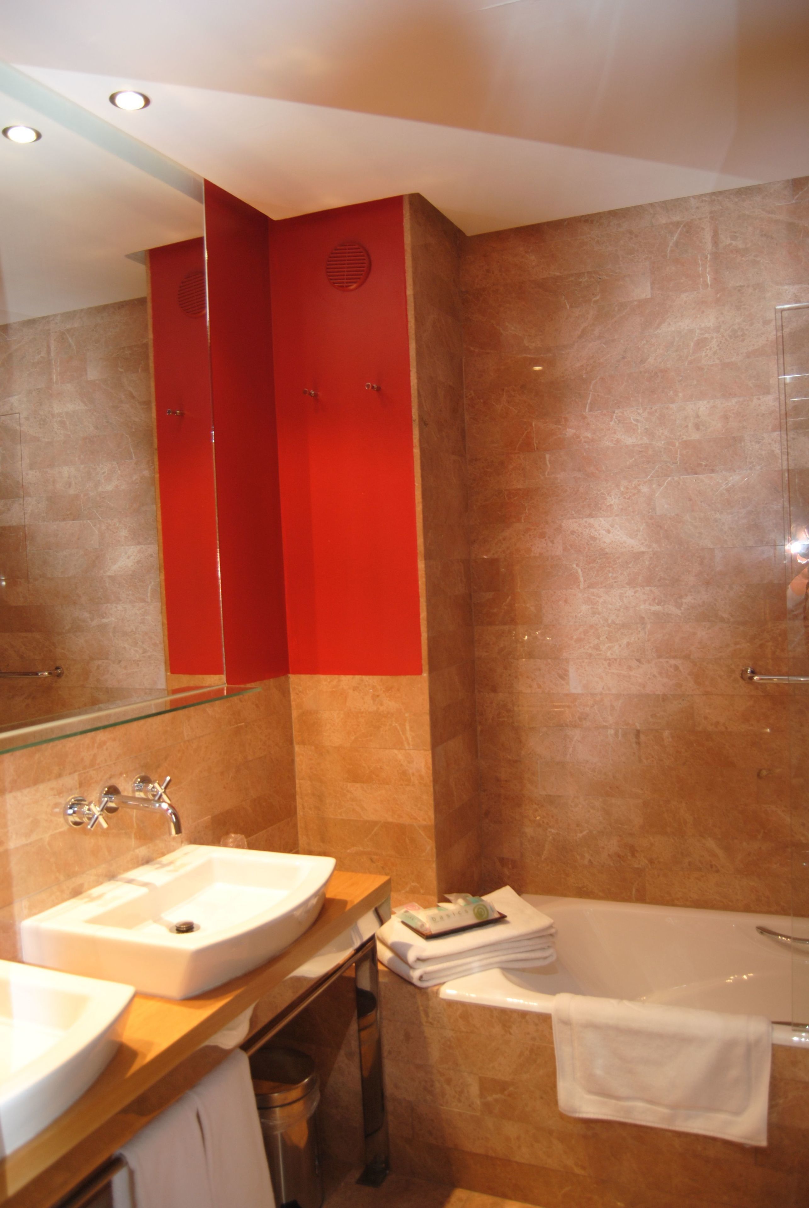 hair dryer, towels, shampoo, toilet paper