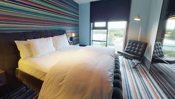 Desk, laptop workspace, blackout drapes, iron/ironing board