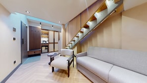 Suite studio Prestige | Aire de séjour | Téléviseur de 60 cm avec télévision par cùble