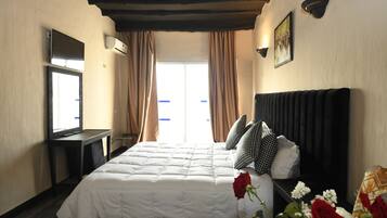 Kahden hengen classic-huone (yksi tai kaksi sänkyä) | Minibaari, tallelokero huoneessa, pimennysverhot, vuodevaatteet