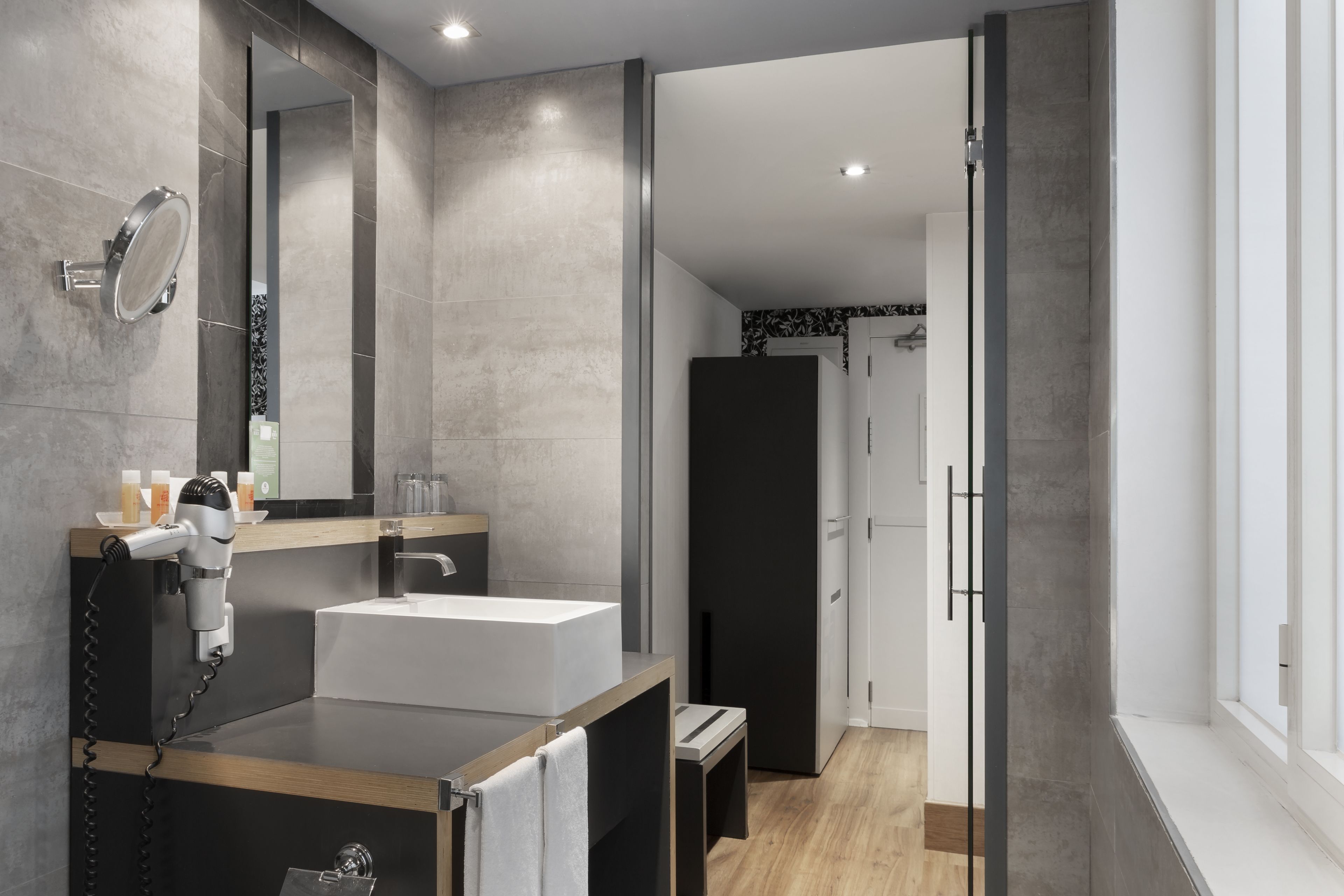 eco-friendly toiletries, hair dryer, towels