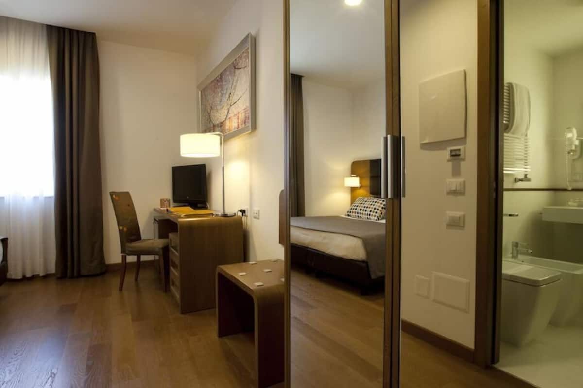 Ropa de cama de alta calidad y minibar