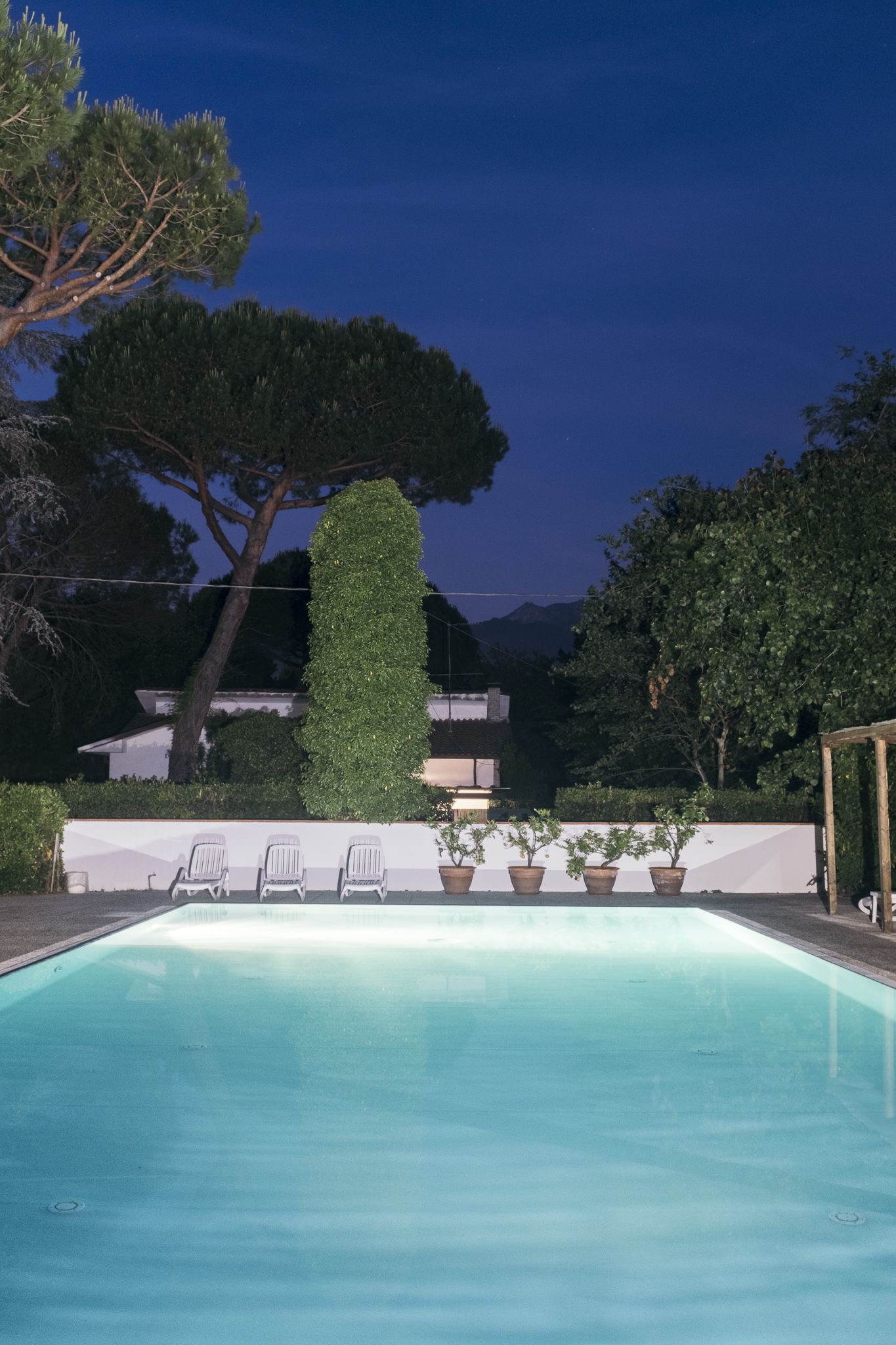 outdoor pool, open 9:30 am to 7:30 pm, pool umbrellas, pool loungers