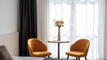 Deluxe Double or Twin Room | Minibar, in-room safe, blackout curtains, iron/ironing board