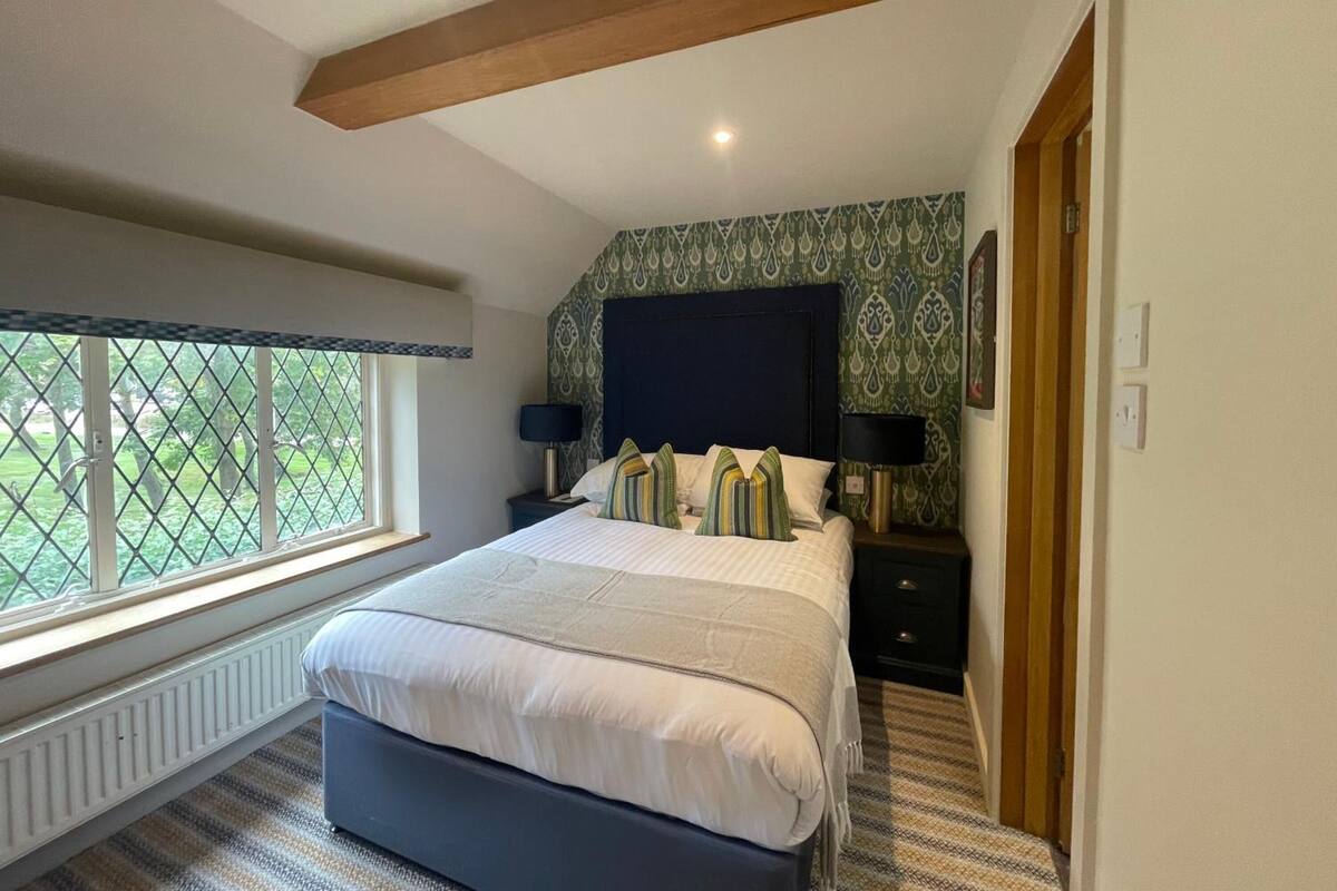 Hypo-allergenic bedding, desk, laptop workspace, iron/ironing board