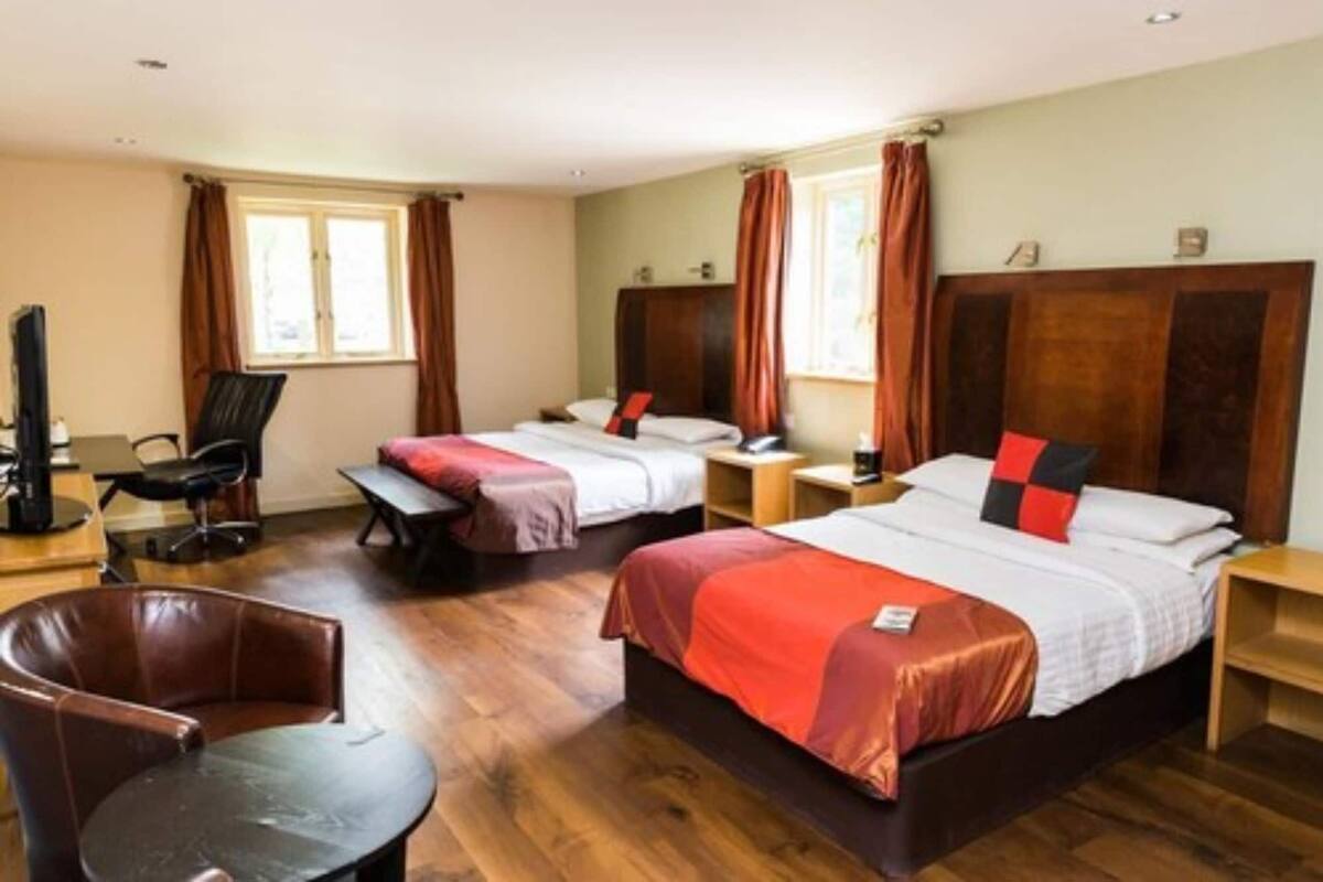 Hypo-allergenic bedding, desk, laptop workspace, iron/ironing board