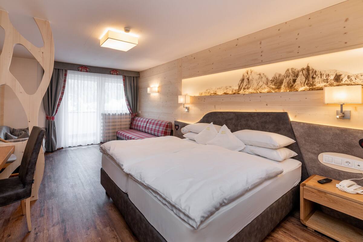 Habitación doble Confort | Ropa de cama de alta calidad y minibar