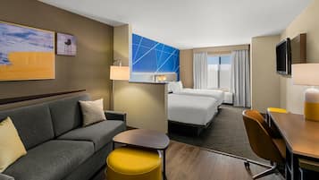 Hypo-allergenic bedding, desk, laptop workspace, blackout curtains