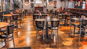 A restaurant with multiple tables and chairs, a polished floor, and framed artwork on the walls. - Holiday Inn Express & Suites Albany Airport Area - Latham by IHG (Latham)