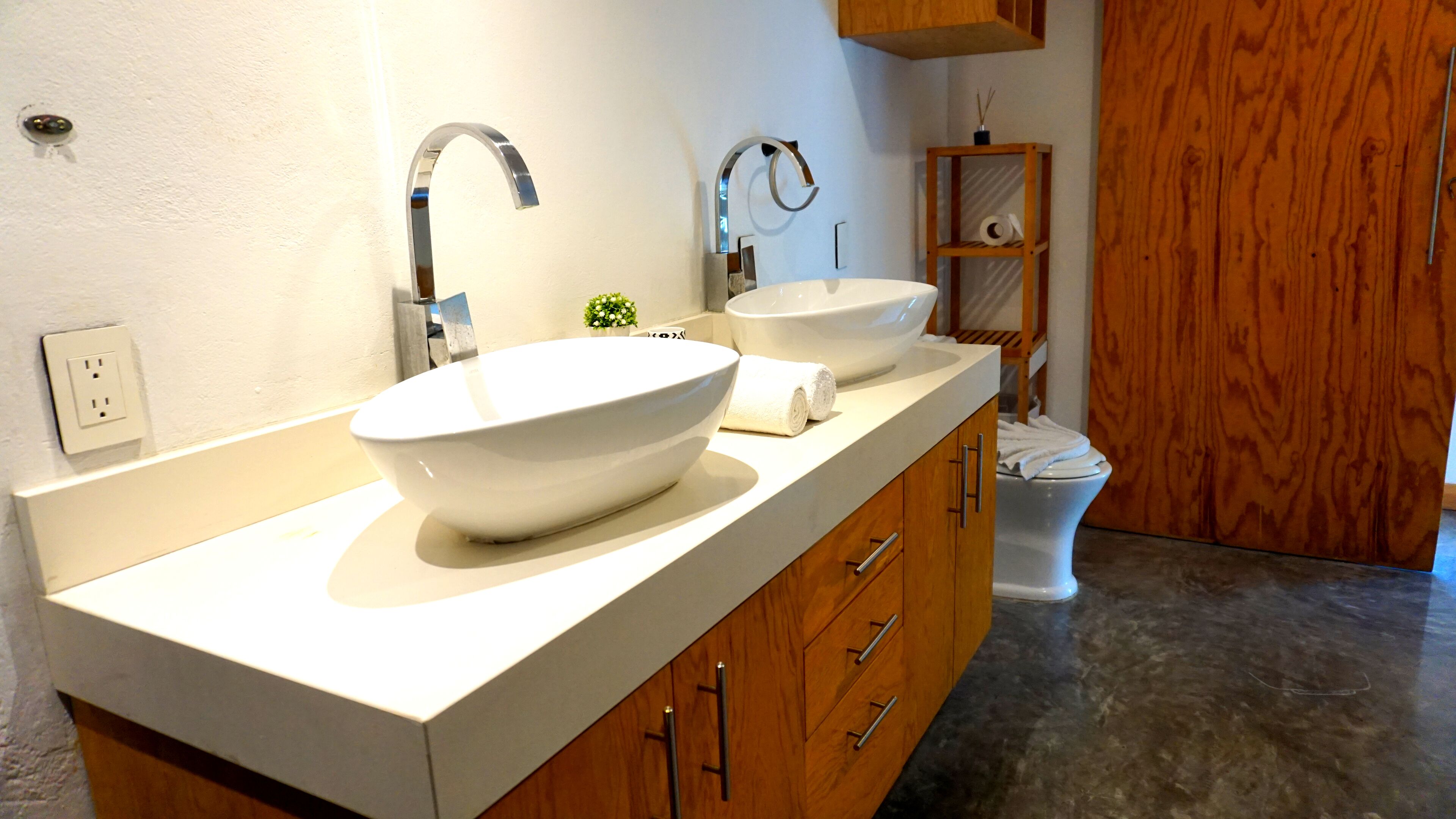 design apartment | bathroom | shower, rainfall showerhead, designer toiletries, hair dryer