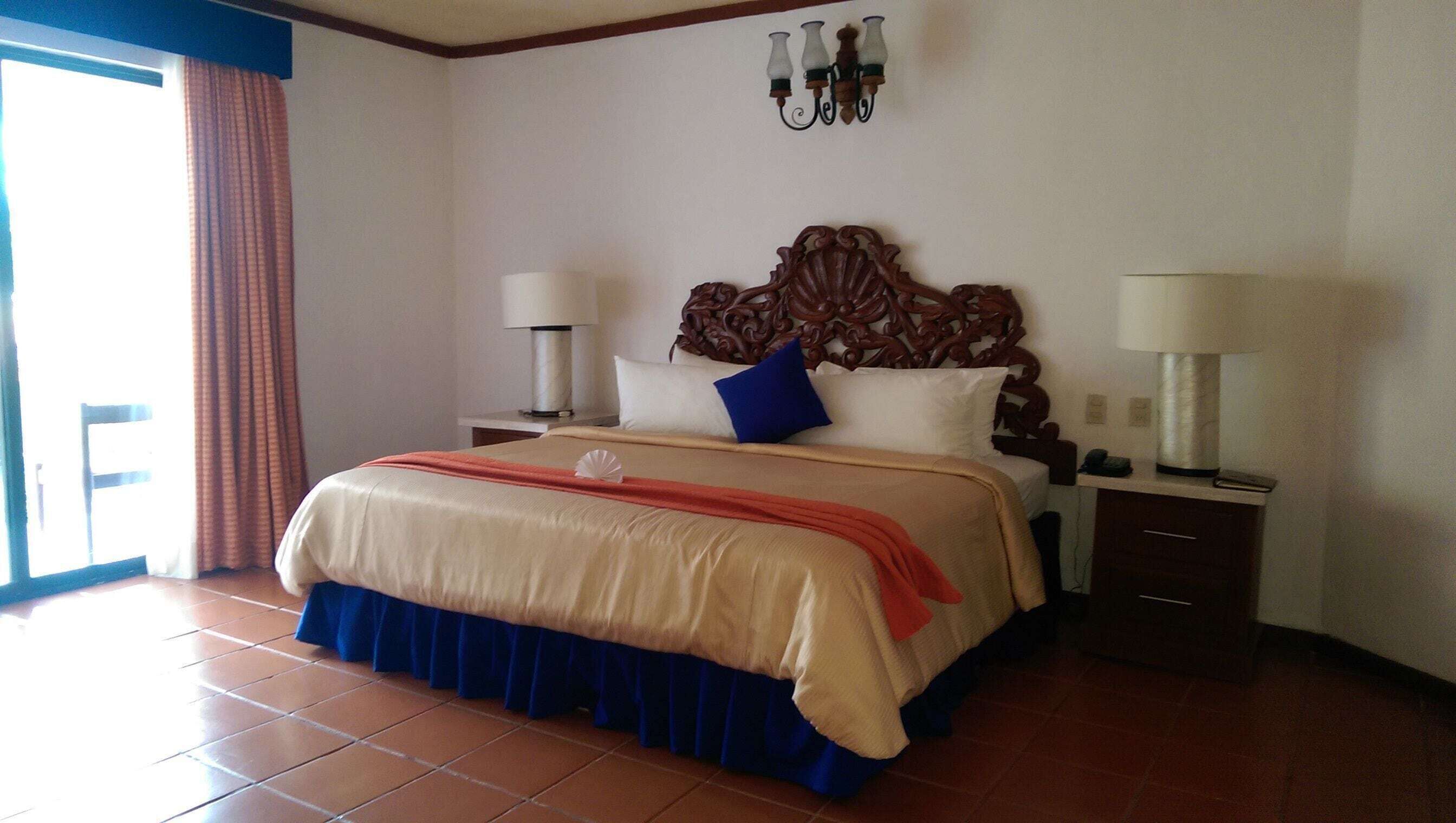 Down comforters, pillowtop beds, in-room safe, desk