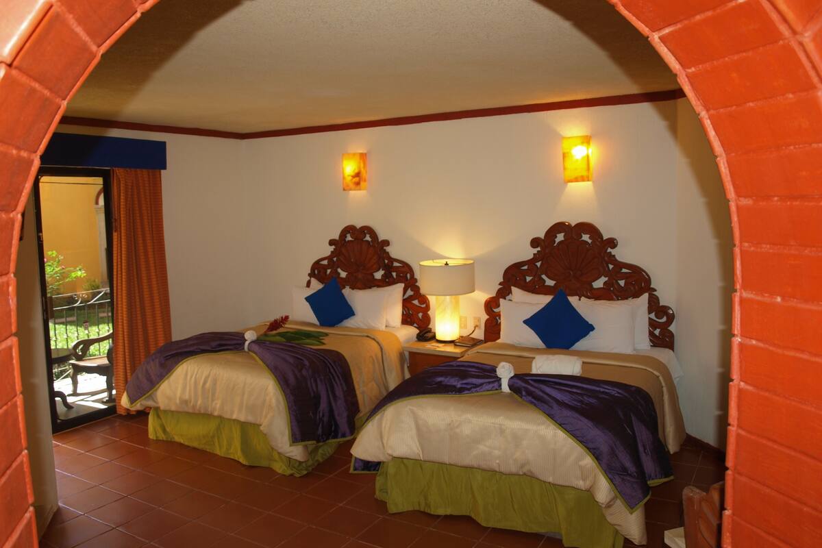 standard double room, 2 double beds | down duvets, pillow-top beds, in-room safe, desk