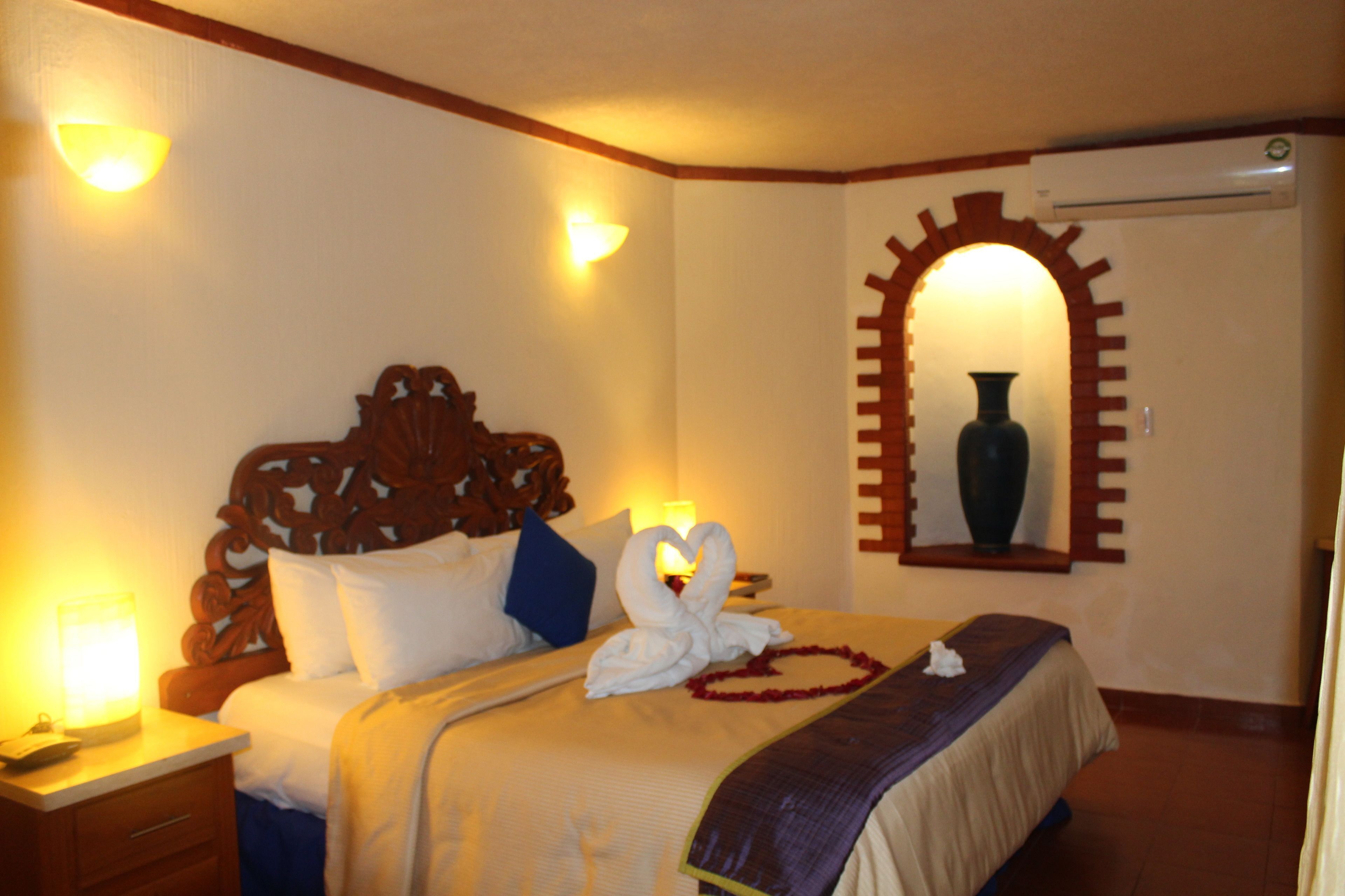 Down comforters, pillowtop beds, in-room safe, desk