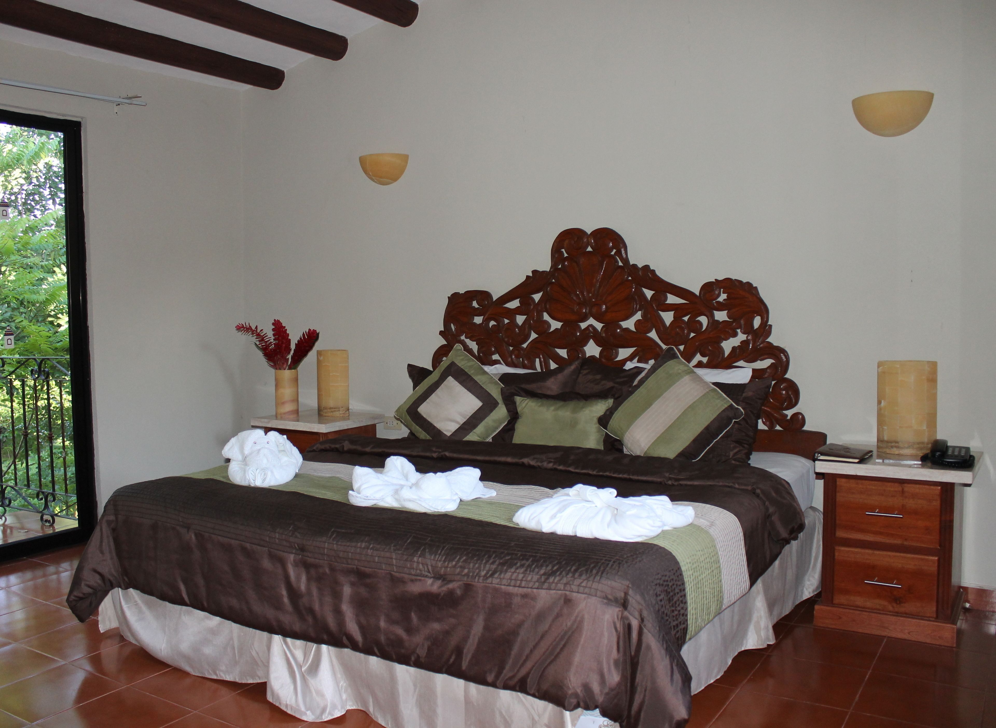 Down comforters, pillowtop beds, in-room safe, desk