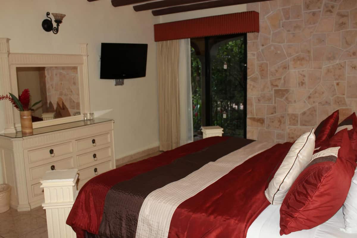 Down comforters, pillowtop beds, in-room safe, desk