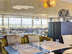 Lunch, dinner served; French cuisine, beach views
