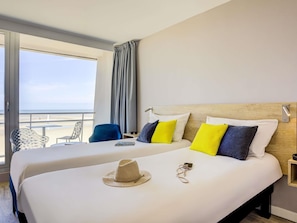 Standard Room, 2 Twin Beds, Balcony, Sea View | In-room safe, desk, blackout drapes, soundproofing