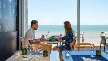 Lunch, dinner served; French cuisine, beach views
