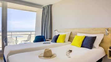 Standard Room, 2 Twin Beds, Balcony, Sea View | In-room safe, desk, blackout drapes, soundproofing
